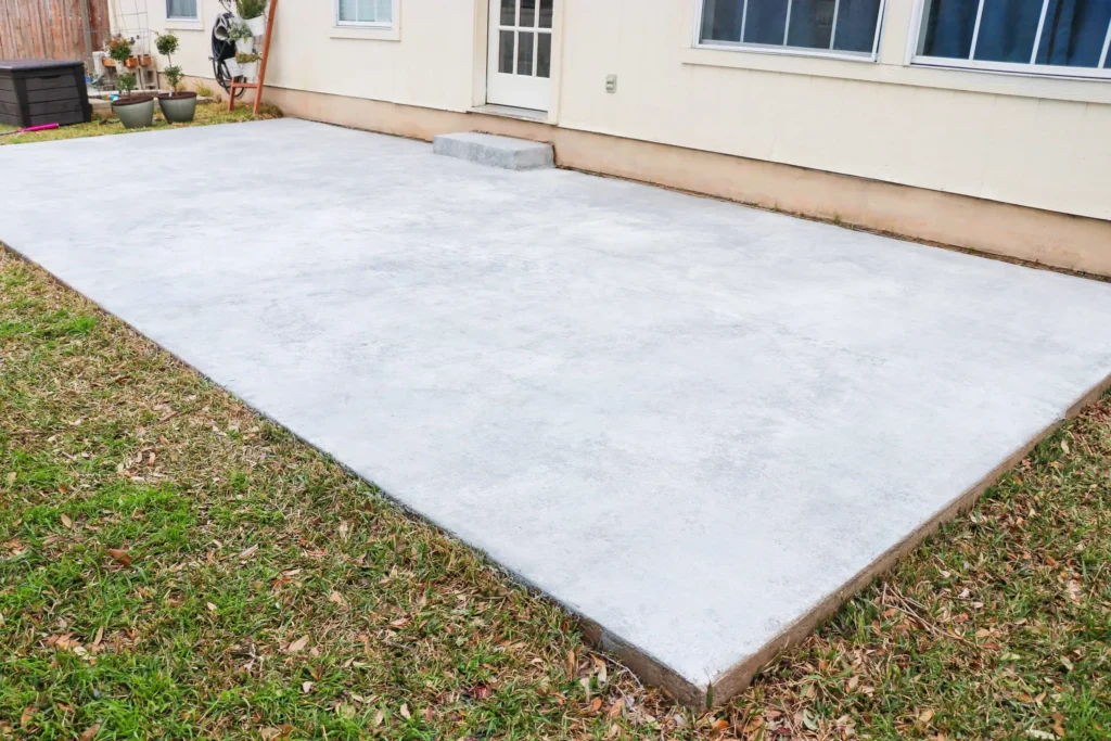 Freshly laid concrete patio providing a smooth outdoor extension, professionally installed by Concrete Invercargill.